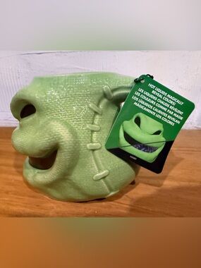 Disney Parks Oogie Boogie Face Ceramic Mug & Purple Bug Pattern w/ hot liquids